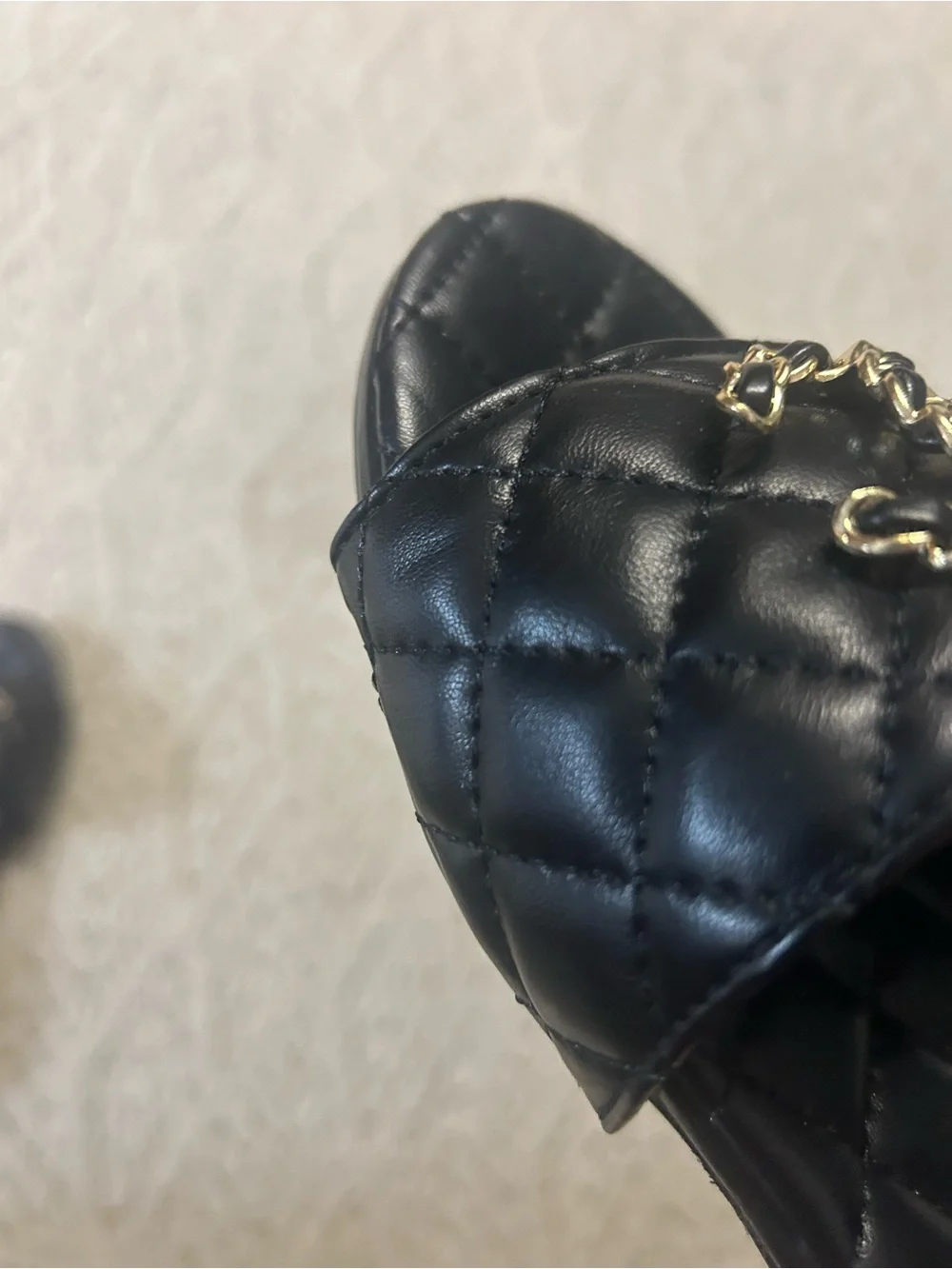 CHANEL Black Quilted Leather Slide Mules with Gold CC Chain